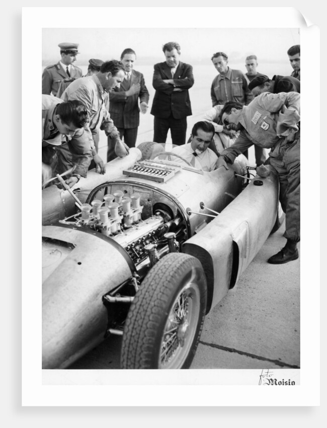Alberto Ascari at the wheel of the new Lancia Grand Prix car, 1955 by Unknown