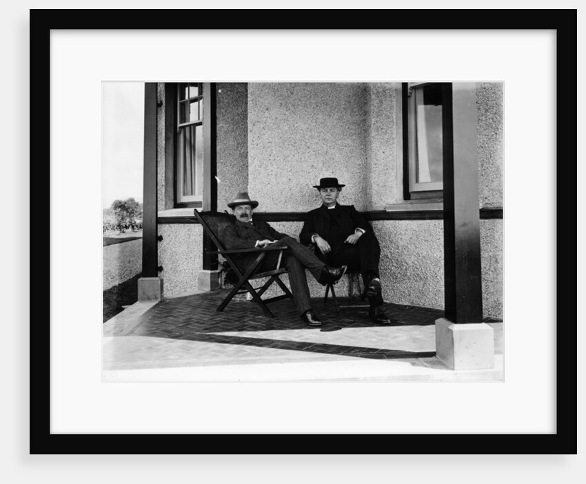 Lloyd George resting on the verandah of a house by Unknown