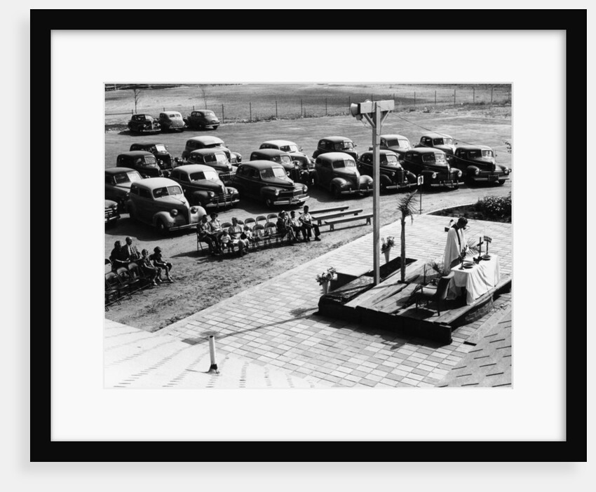 Outdoor church service with cars parked behind, USA, (1950s?) by Unknown