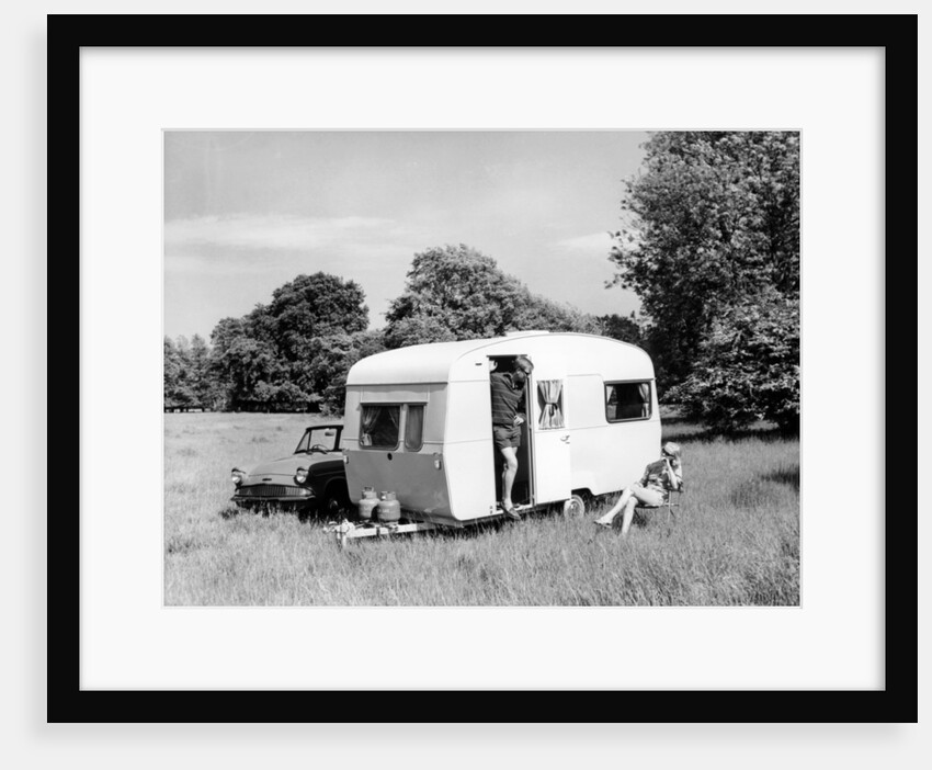 Couple on holiday with their 1963 Sprite Alpine caravan, (c1963?) by Unknown