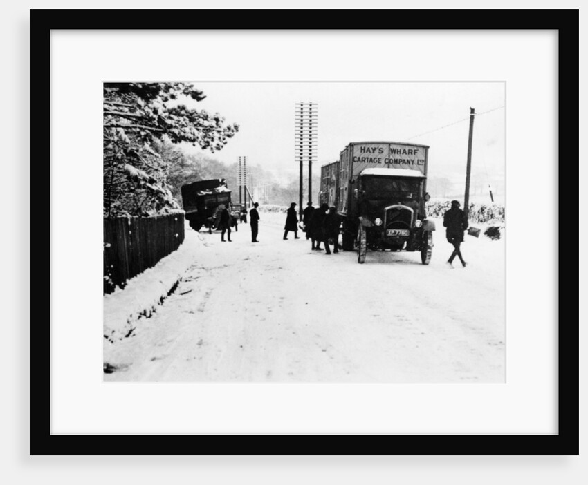 A Hay's Wharf Cartage Company Ltd van along a snowy A30, near Basingstoke, Hampshire, 1920s by Unknown