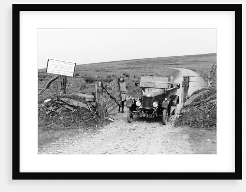 A Morris Bullnose driving through a gateway, early 1920s by Unknown