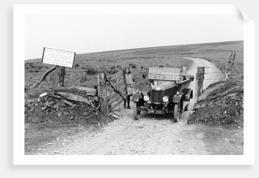 A Morris Bullnose driving through a gateway, early 1920s by Unknown