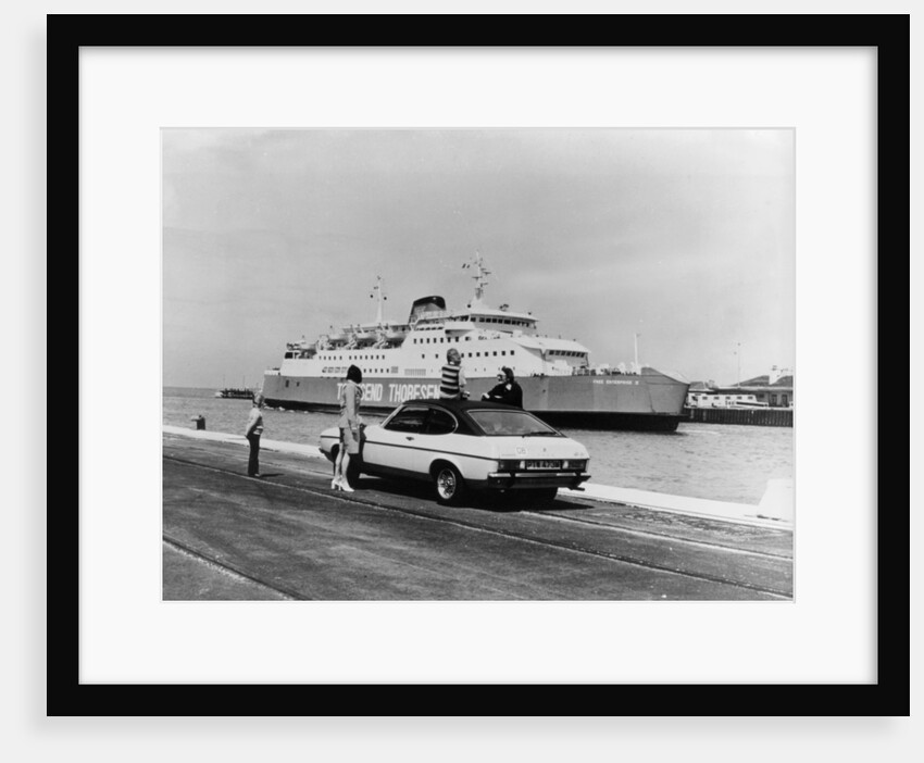 A 1974 Ford Capri on a quay, in front of a Townsend Thoresen car ferry, 1970s by Unknown
