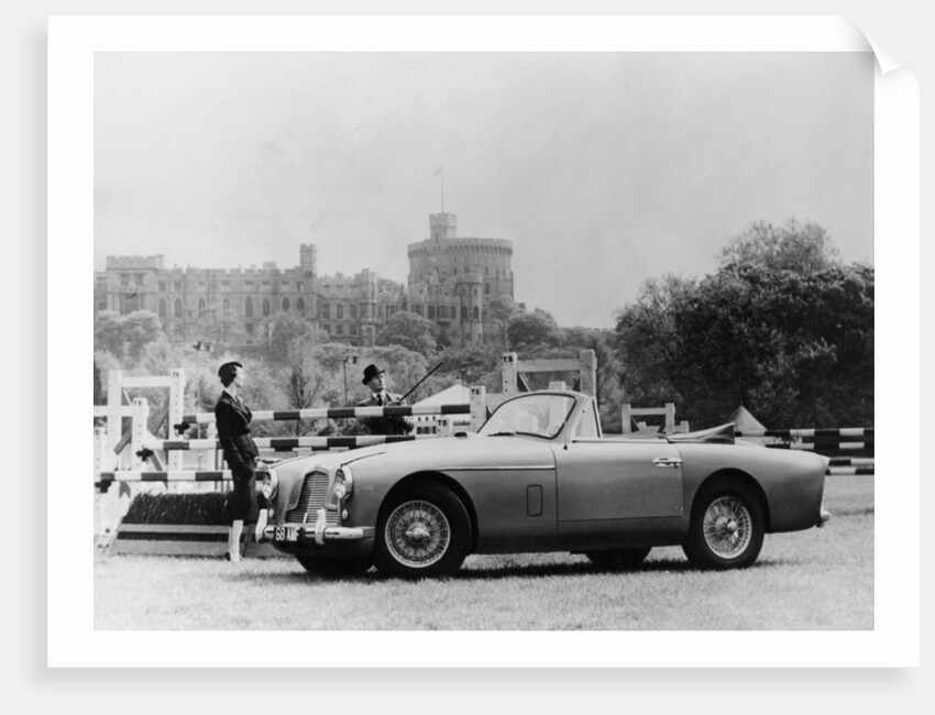 An Aston Martin DB2-4 MKII, with Windsor Castle in the background, 1956 by Unknown
