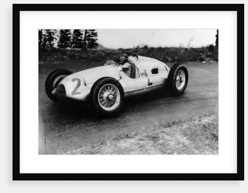 Tazio Nuvolari driving a 3 litre Auto Union in a Grand Prix, 1939 by Unknown