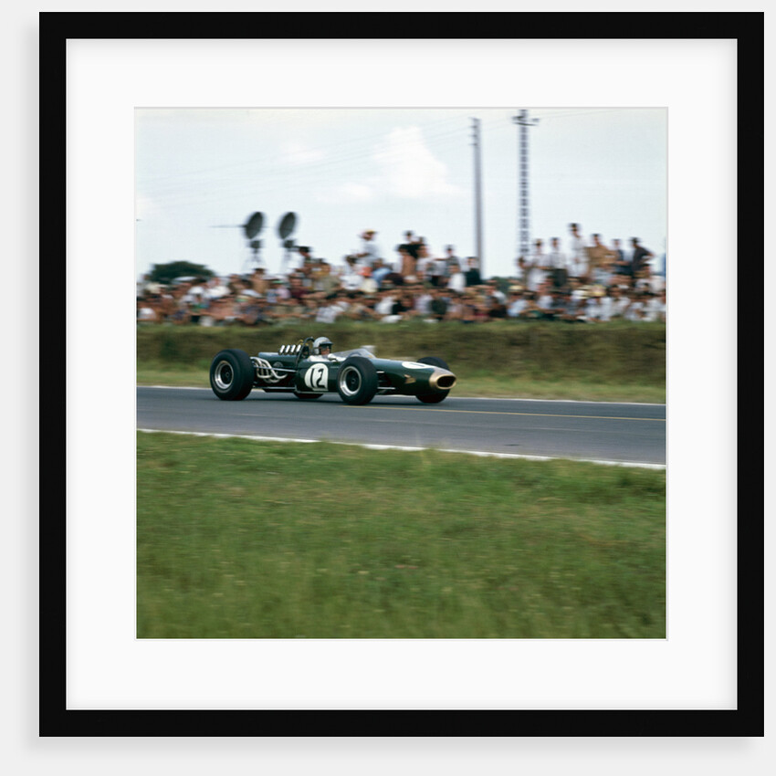 Jack Brabham racing a Brabham-Repco BT19 by Anonymous