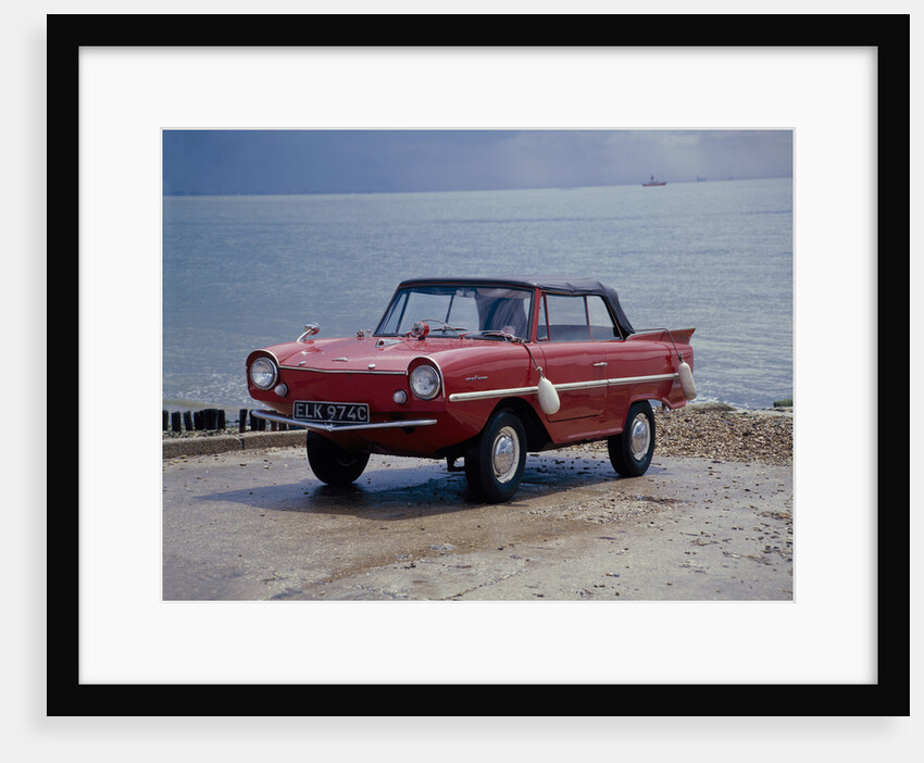 A 1965 Amphicar at the water's edge by Unknown