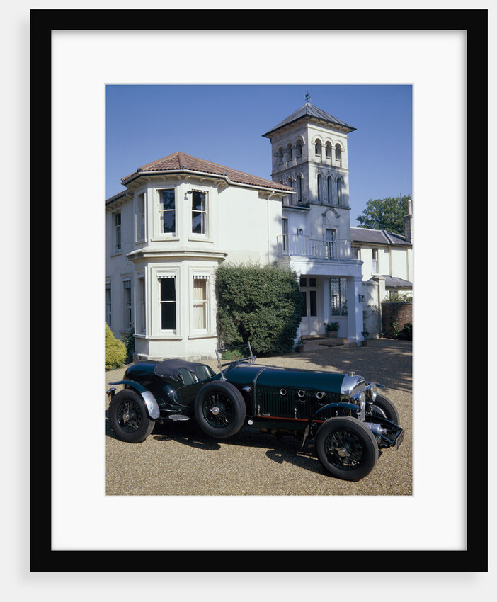 A 1930 Bentley Supercharged outside a house by Unknown