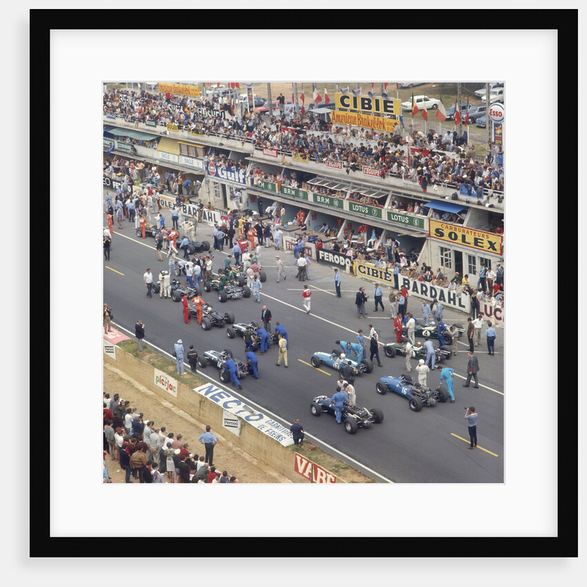 Cars lining up on the starting grid by Anonymous