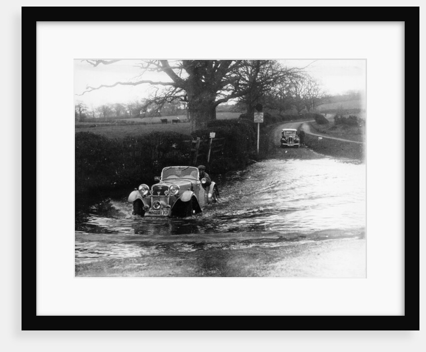 1935 Singer 1.5 Litre Le Mans taking part in a water splash trial, (1935?) by Unknown