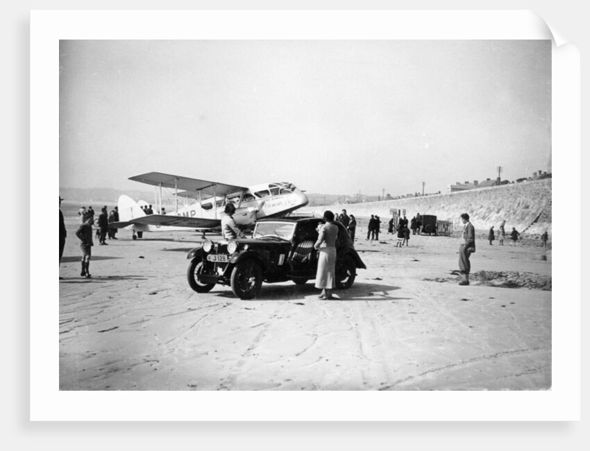 Riley Kestrel and a Dragon aircraft on a beach, 1934 by Unknown