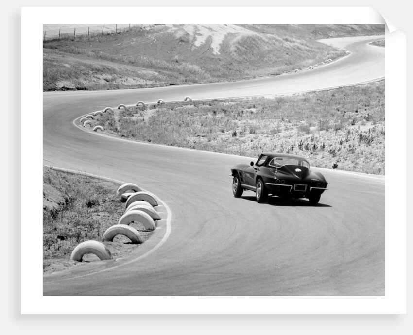 1964 Chevrolet Corvette Stingray on a winding racetrack, (c1964?) by Unknown