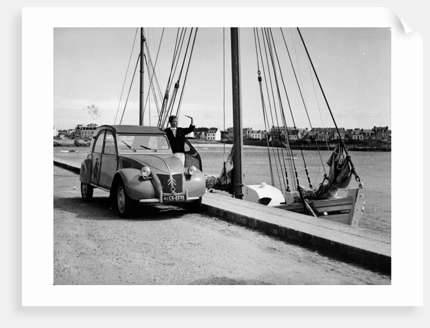 A Citroën 2CV on the quay at a harbour, c1957 by Unknown