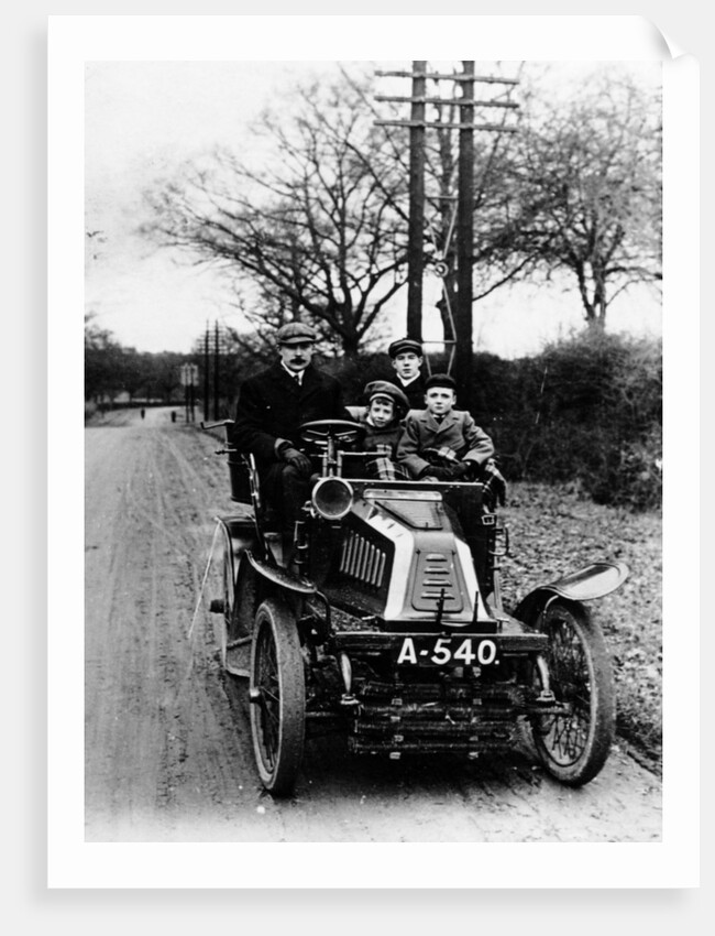 A man and boys in a De Dion car, 1908 by Unknown