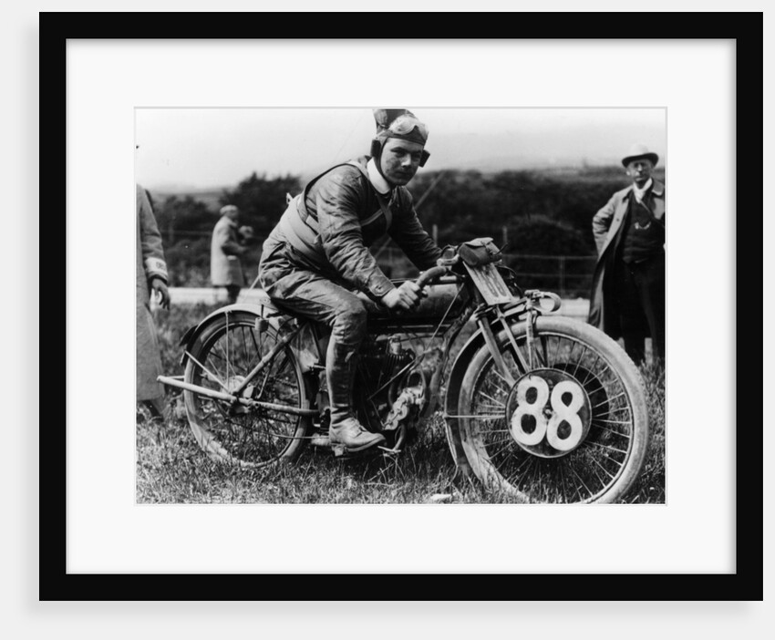 A man dressed in leathers on a Harley-Davidson by Unknown