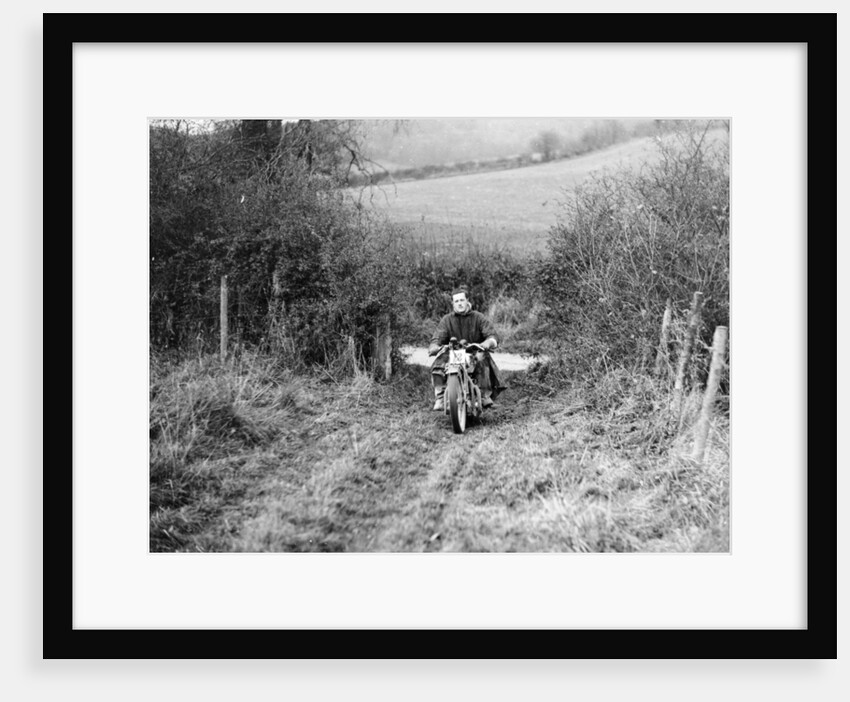 Syke riding an Ariel 4 during the Inter Varsity motor cross hill climb, November 1931 by Unknown
