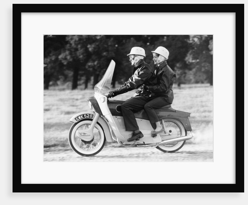 A man and a woman riding an Ariel Leader, 1958 by Unknown