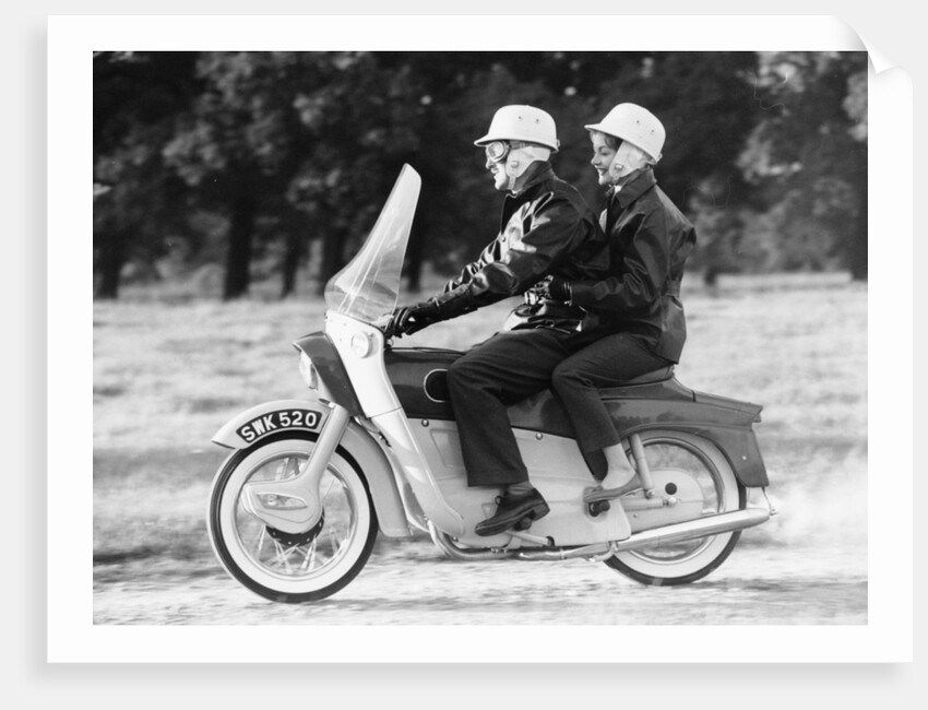 A man and a woman riding an Ariel Leader, 1958 by Unknown