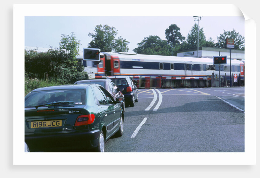 Traffic queue at level crossing in Brockenhurst, Hampshire by Unknown