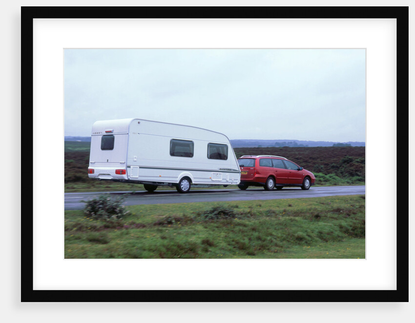 2002 Citroen C5 towing a caravan by Unknown
