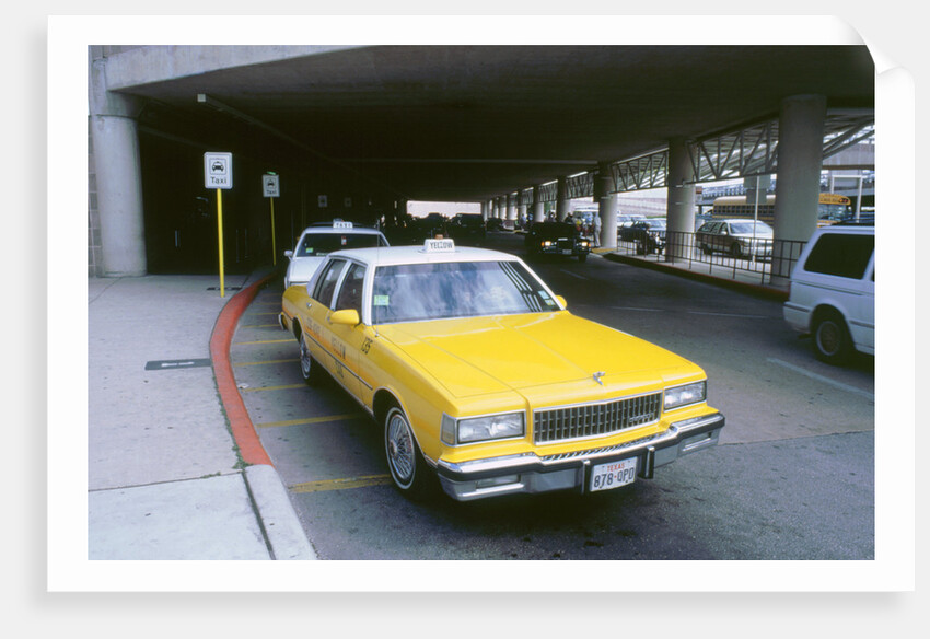 Yellow taxi cab at airport by Unknown