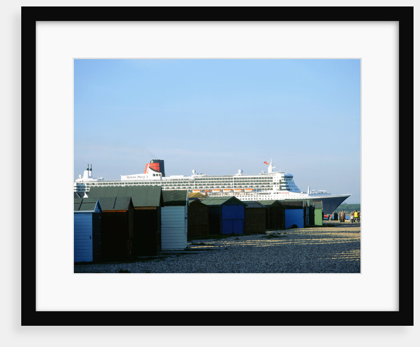 Queen Mary II sails past Beach Huts, Calshot May 2004 by Unknown
