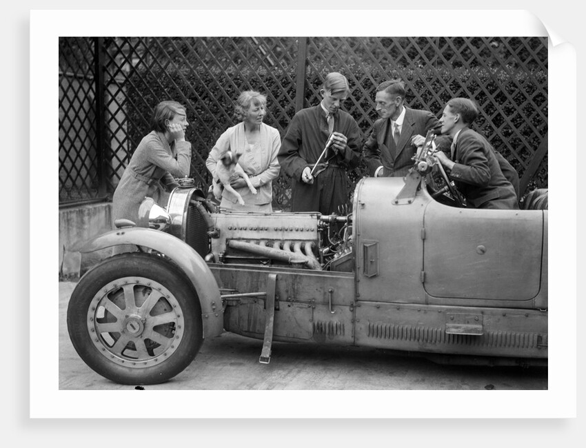 Denis Evans inspecting the plugs of his Bugatti Type 43 2262cc by Bill Brunell