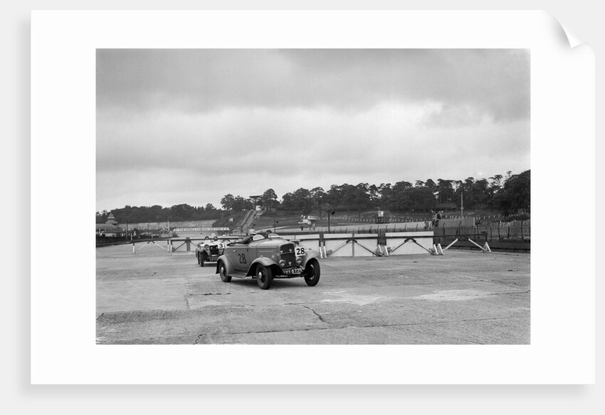 J Cleland's Ford V8 and JH Barker's Riley Lynx at the chicane, JCC Members Day, Brooklands, 1939 by Bill Brunell