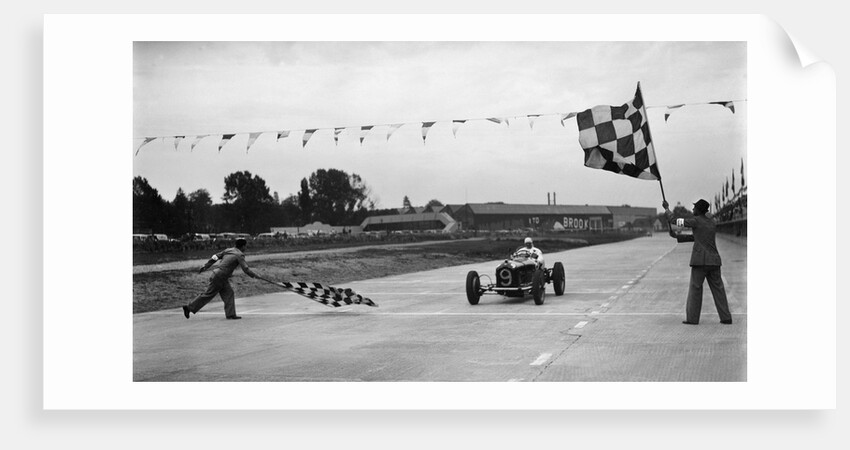 Alfa Romeo taking the chequred flag in a race at Brooklands by Bill Brunell