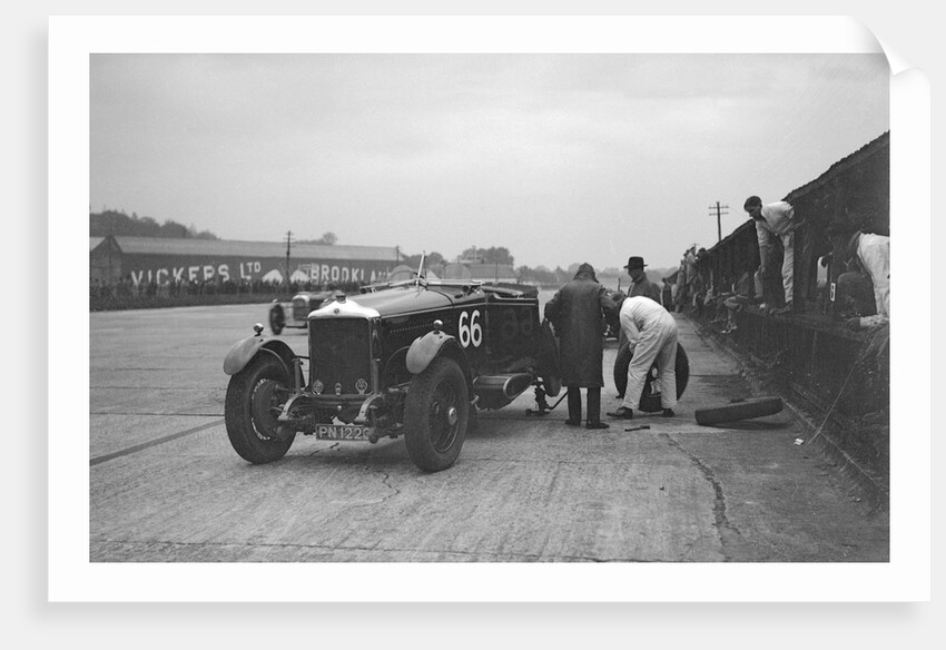 GL Baker's 5954 cc Minerva undergoing a rear wheel change at Brooklands by Bill Brunell