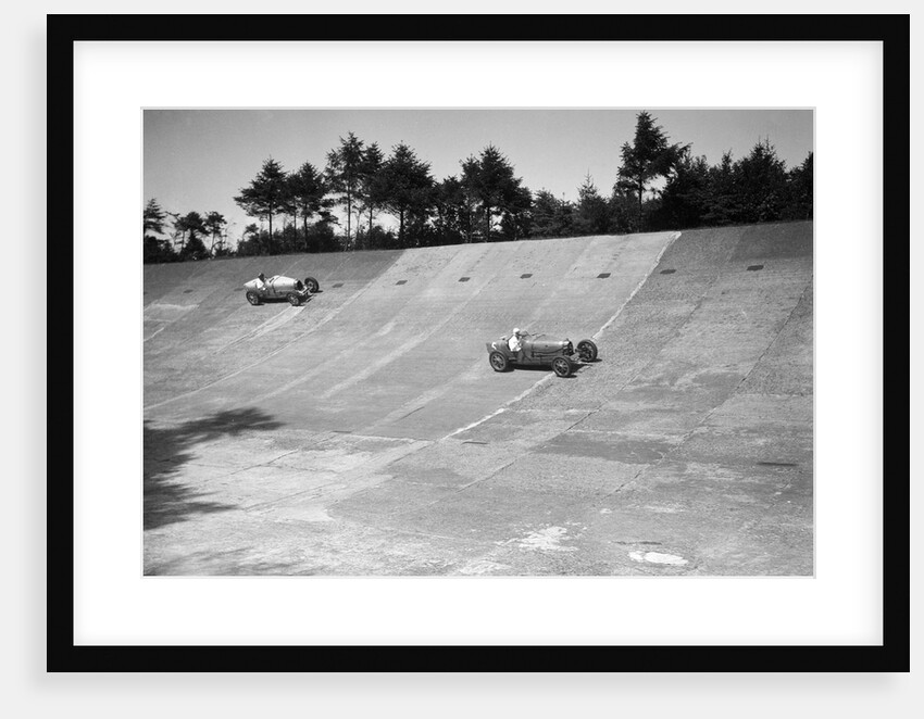 Two Bugatti Type 35s racing on the Members Banking at Brooklands by Bill Brunell