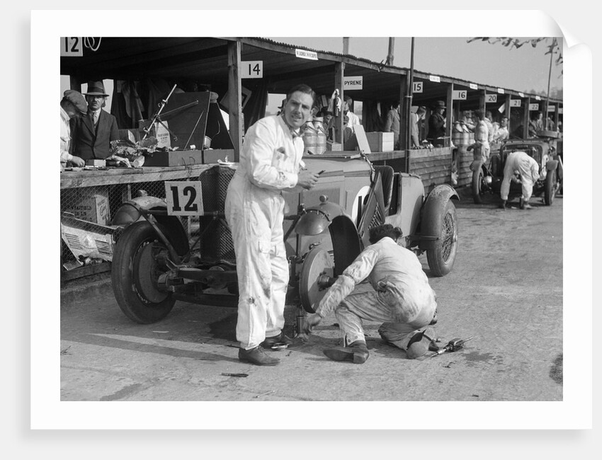 Mechanic working on a Talbot 105 at the JCC Double Twelve race, Brooklands, 8/9 May 1931 by Bill Brunell