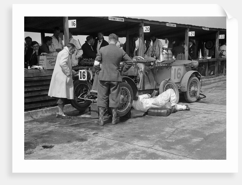 Mechanic working on a Lea Francis J type at the JCC Double Twelve race, Brooklands, May 1931 by Bill Brunell