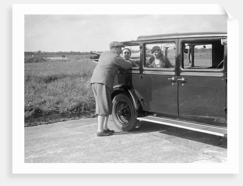 Hugh McConnell, Sammy Davis and Mrs Davis with an Austin 20/6 landaulette at Brooklands, 1931 by Bill Brunell