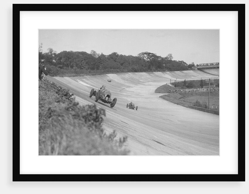 Sir Henry Birkin's Bentley leading Earl Howe's Bugatti Type 54, BARC meeting, Brooklands, May 1932 by Bill Brunell