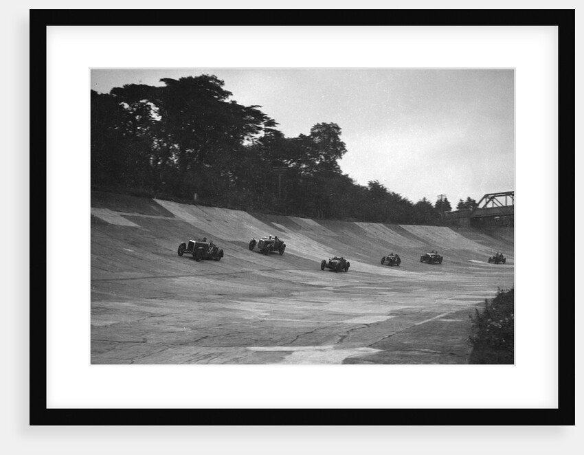 Cars racing on the banking at a JCC Members Day, Brooklands by Bill Brunell