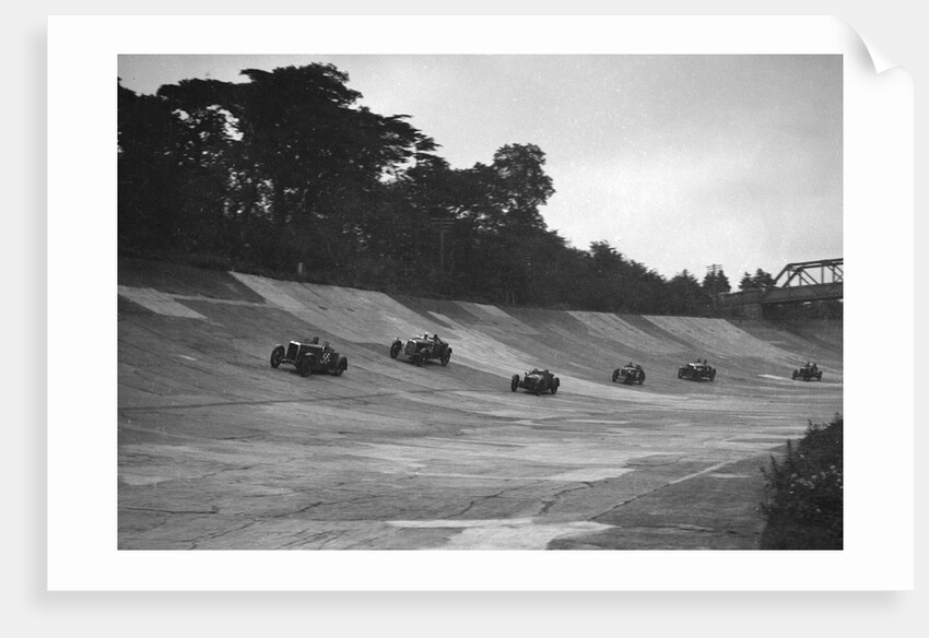 Cars racing on the banking at a JCC Members Day, Brooklands by Bill Brunell