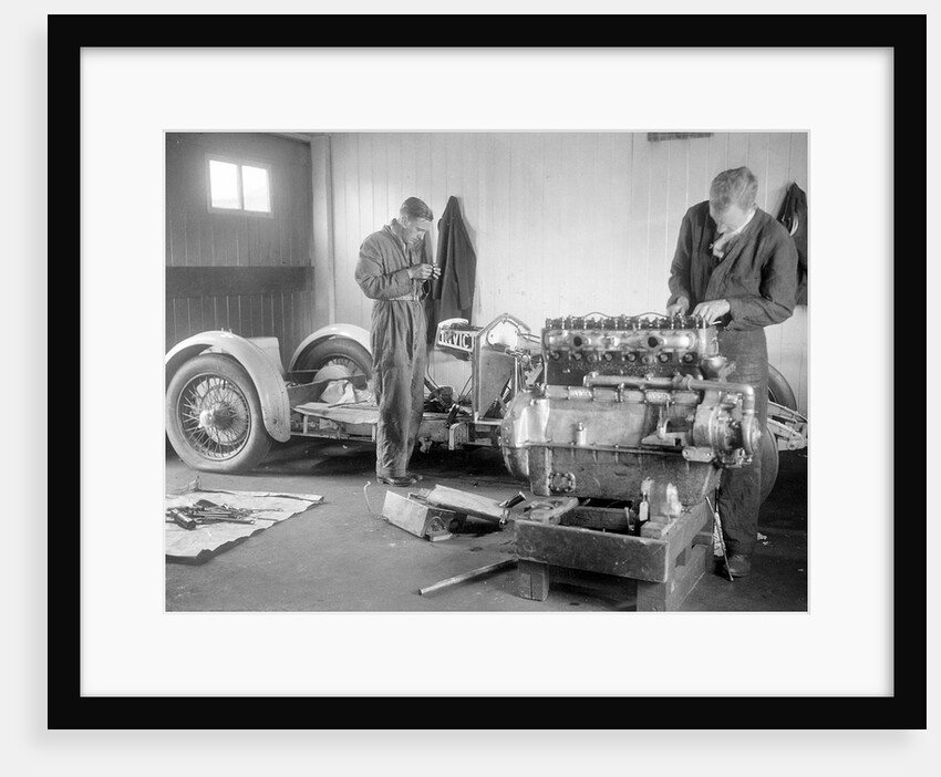 Mechanics working on Raymond Mays' 4500 cc Invicta car by Bill Brunell