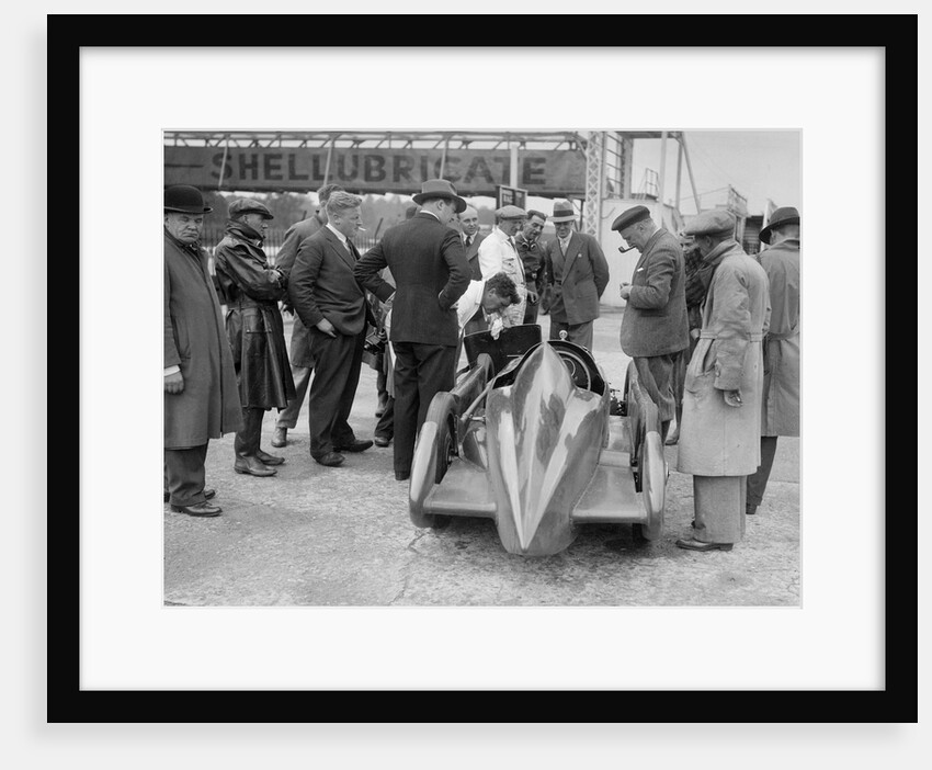 People examining Leon Cushman's Austin 7 racer at Brooklands for a speed record attempt, 1931 by Bill Brunell