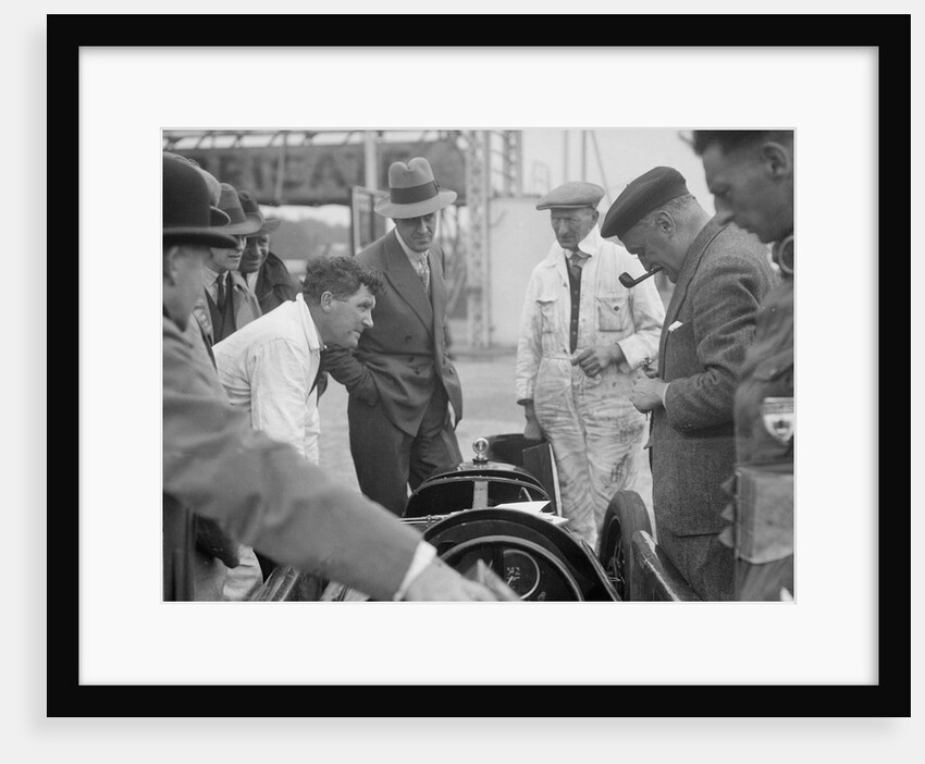 People examining Leon Cushman's Austin 7 racer at Brooklands for a speed record attempt, 1931 by Bill Brunell