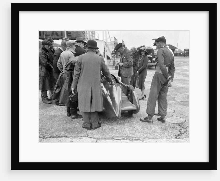 People examining Leon Cushman's Austin 7 racer at Brooklands for a speed record attempt, 1931 by Bill Brunell