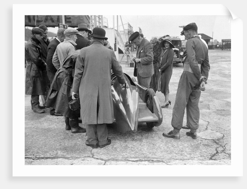 People examining Leon Cushman's Austin 7 racer at Brooklands for a speed record attempt, 1931 by Bill Brunell
