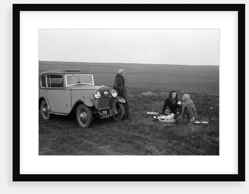 Three women having a picnic during a road test of a Triumph Scorpion, 1931 by Bill Brunell