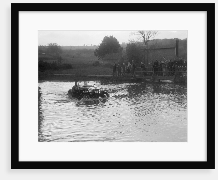 MG PA driving through a ford during a motoring trial, 1936 by Bill Brunell