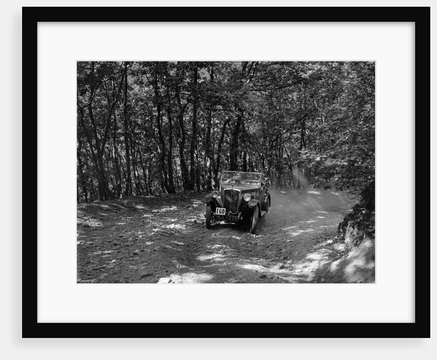 Morris Minor competing in the B&HMC Brighton-Beer Trial, Fingle Bridge Hill, Devon, 1934 by Bill Brunell
