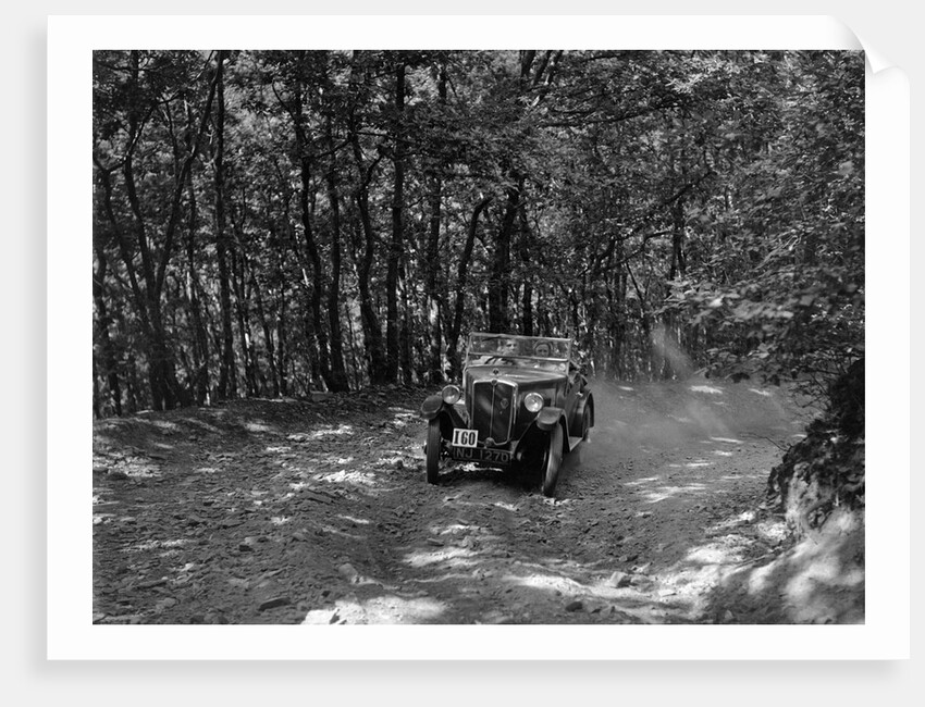 Morris Minor competing in the B&HMC Brighton-Beer Trial, Fingle Bridge Hill, Devon, 1934 by Bill Brunell