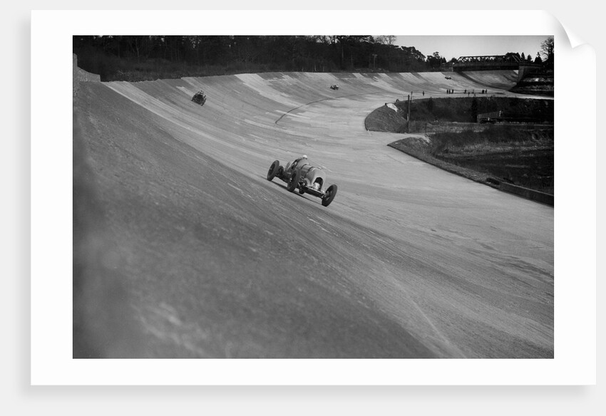 Bentley of Tim Birkin on the way to winning a race at a BARC meeting, Brooklands, 1930 by Bill Brunell