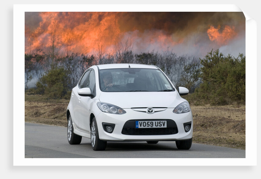 2010 Mazda 2 Sport, controlled burning in New Forest by Unknown