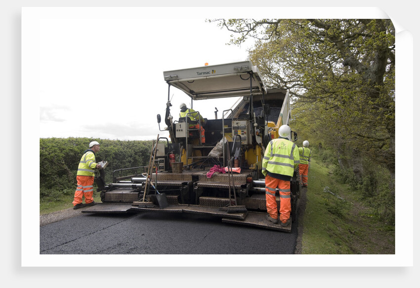 Road resurfacing work repairing potholes by Unknown